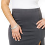 Woman wearing set of silver minimalist bangles