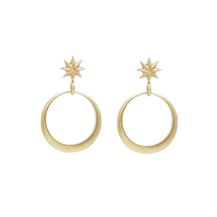 Minimalist drop earrings with tapered ring suspended from an estrella stud in yellow bronze