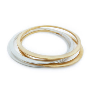 Set of silver and gold minimalist bangles